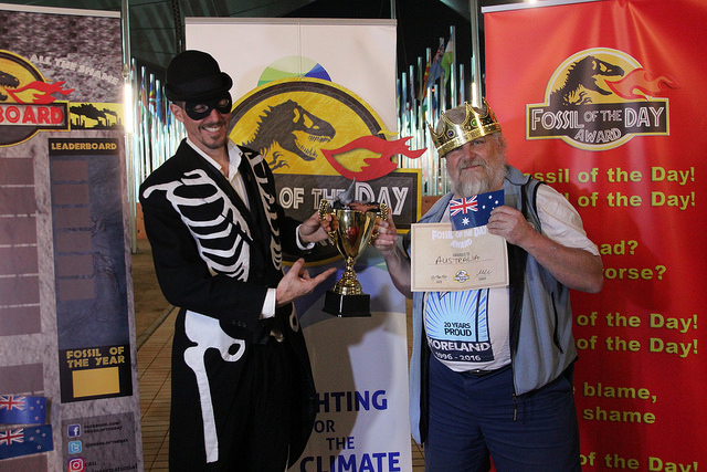 CAMoreland member John Englart accepts Fossil Of The Day award at COP22